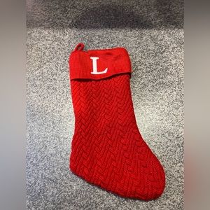 Large “L” Knit monogram Christmas stocking in red.